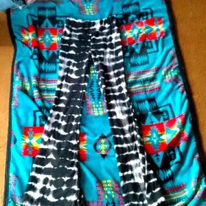 Stretchy black and white leggings with flare